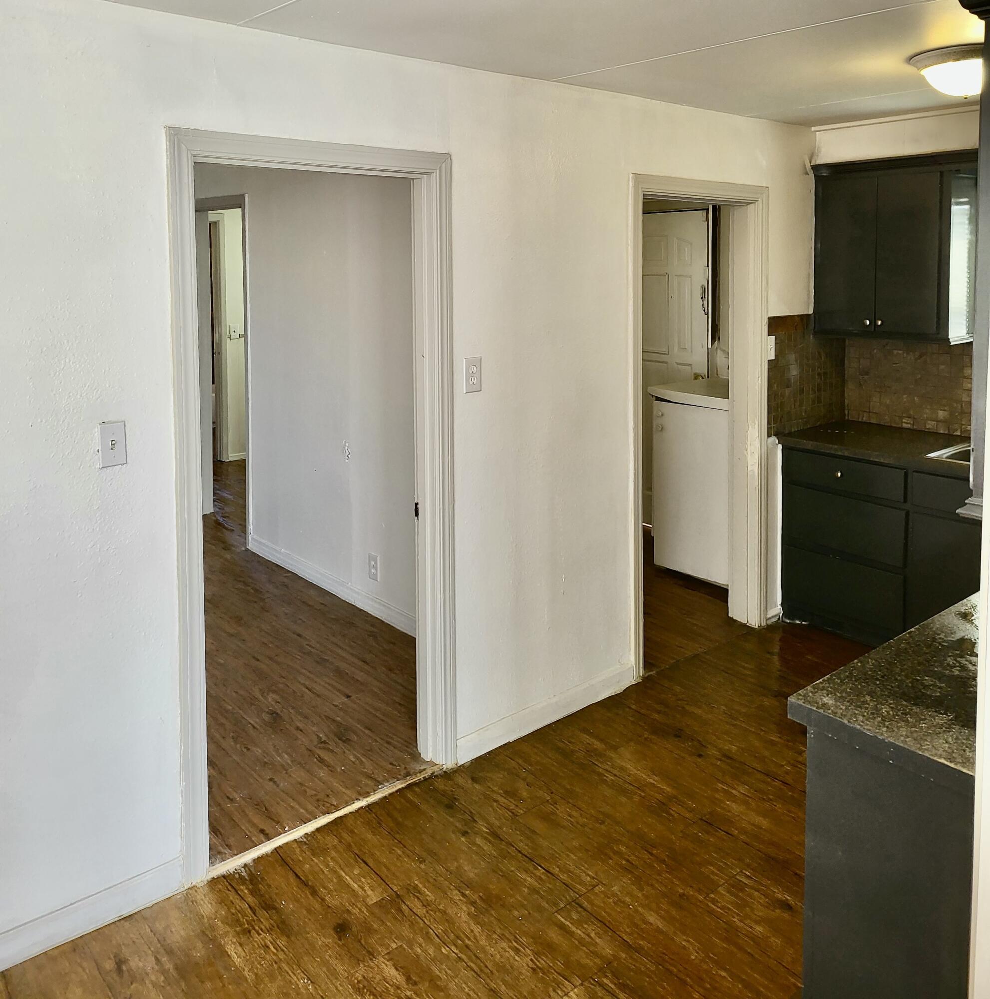 2824 Bates Street Lubbock, TX 79415 - Photo 18 of 19 a kitchen with a refrigerator and a stove top oven