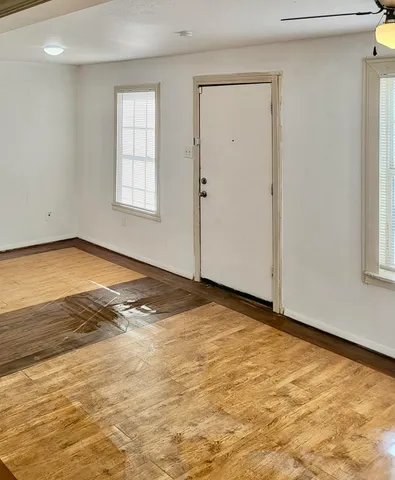 an empty room with window