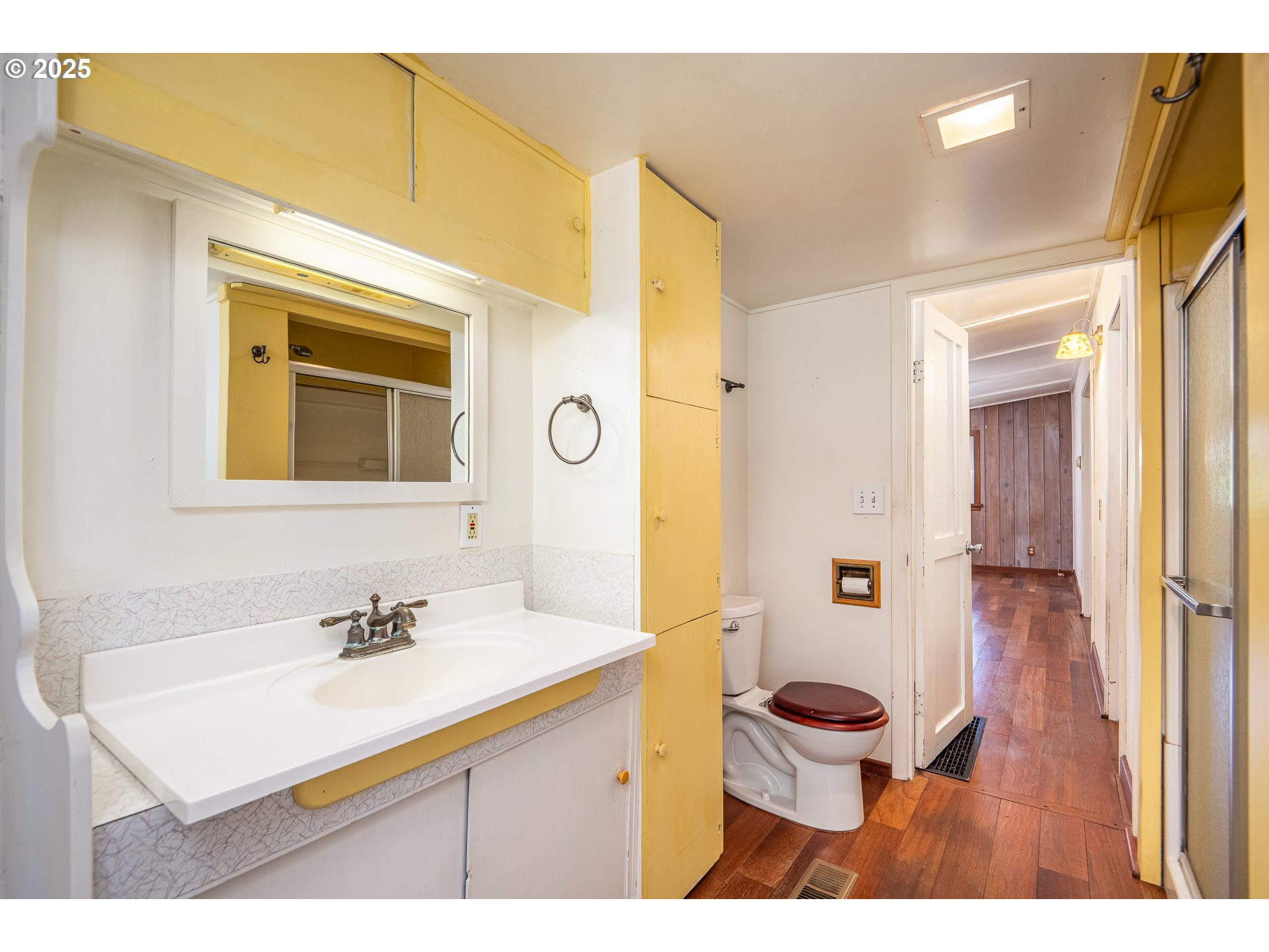 32468 Dillard Road Eugene, OR 97405 - Photo 16 of 28 a bathroom with a sink mirror toilet and shower