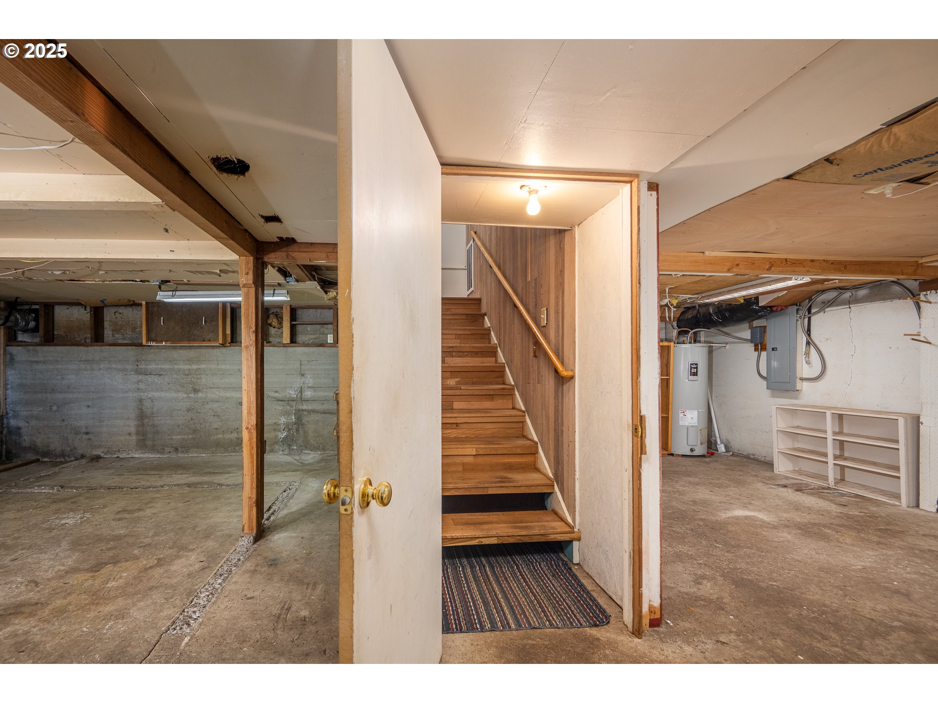 32468 Dillard Road Eugene, OR 97405 - Photo 19 of 28 a view of a livingroom with wooden floor and stairs