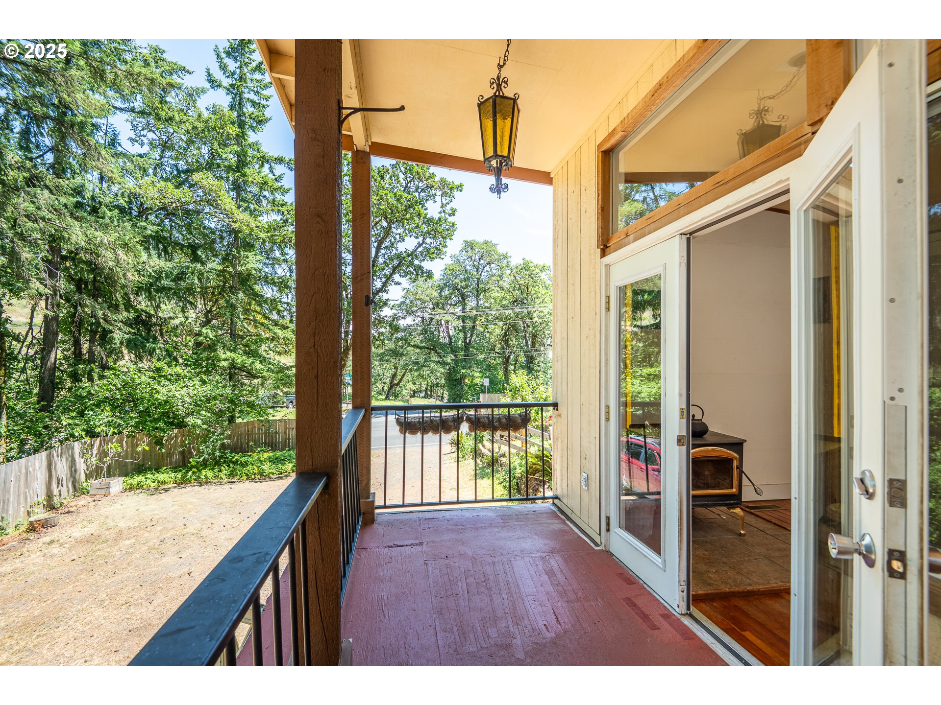 32468 Dillard Road Eugene, OR 97405 - Photo 8 of 28 a view of a porch with wooden floor and outdoor space