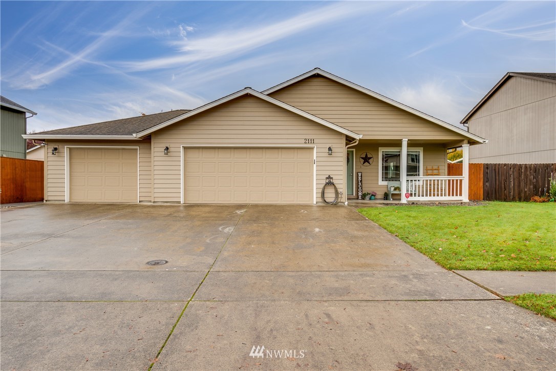 2111 Grove Street Longview, WA 98632 - Photo 1 of 26 a view of a house with a yard