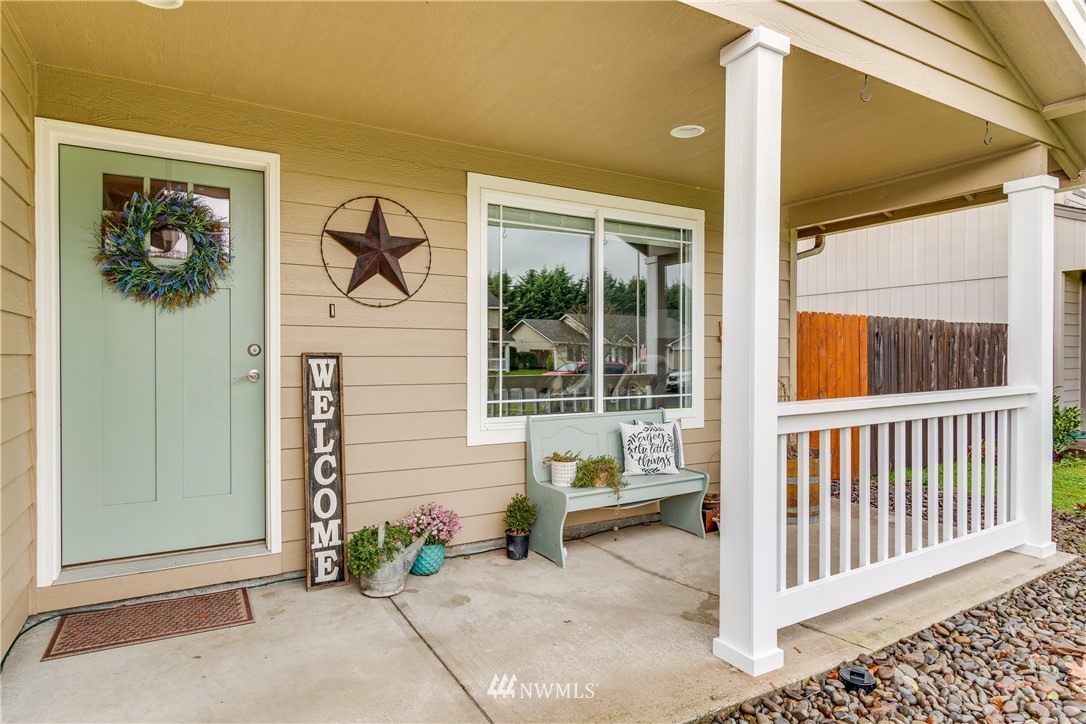 2111 Grove Street Longview, WA 98632 - Photo 2 of 26 a view of a door and chair and door