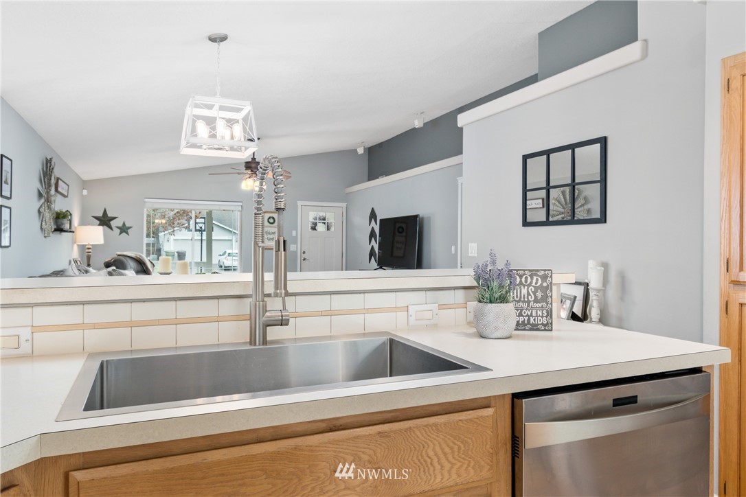 2111 Grove Street Longview, WA 98632 - Photo 12 of 26 a view with a sink and chandelier