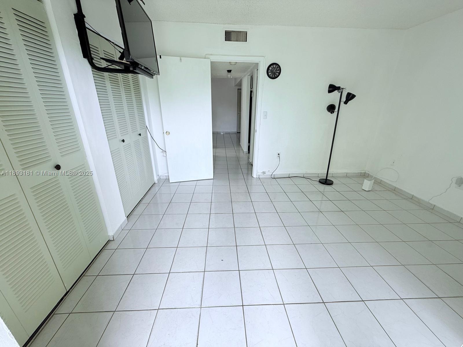 300 Northwest 42nd Avenue, Unit 109 Miami, FL 33126 - Photo 11 of 18 a view of an empty room