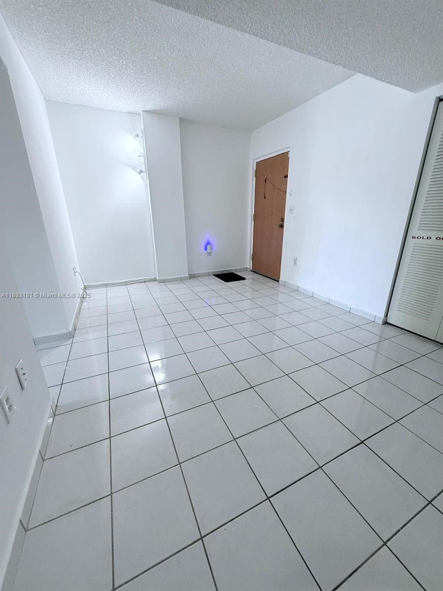 300 Northwest 42nd Avenue, Unit 109 Miami, FL 33126 - Photo 4 of 18 a view of an empty room