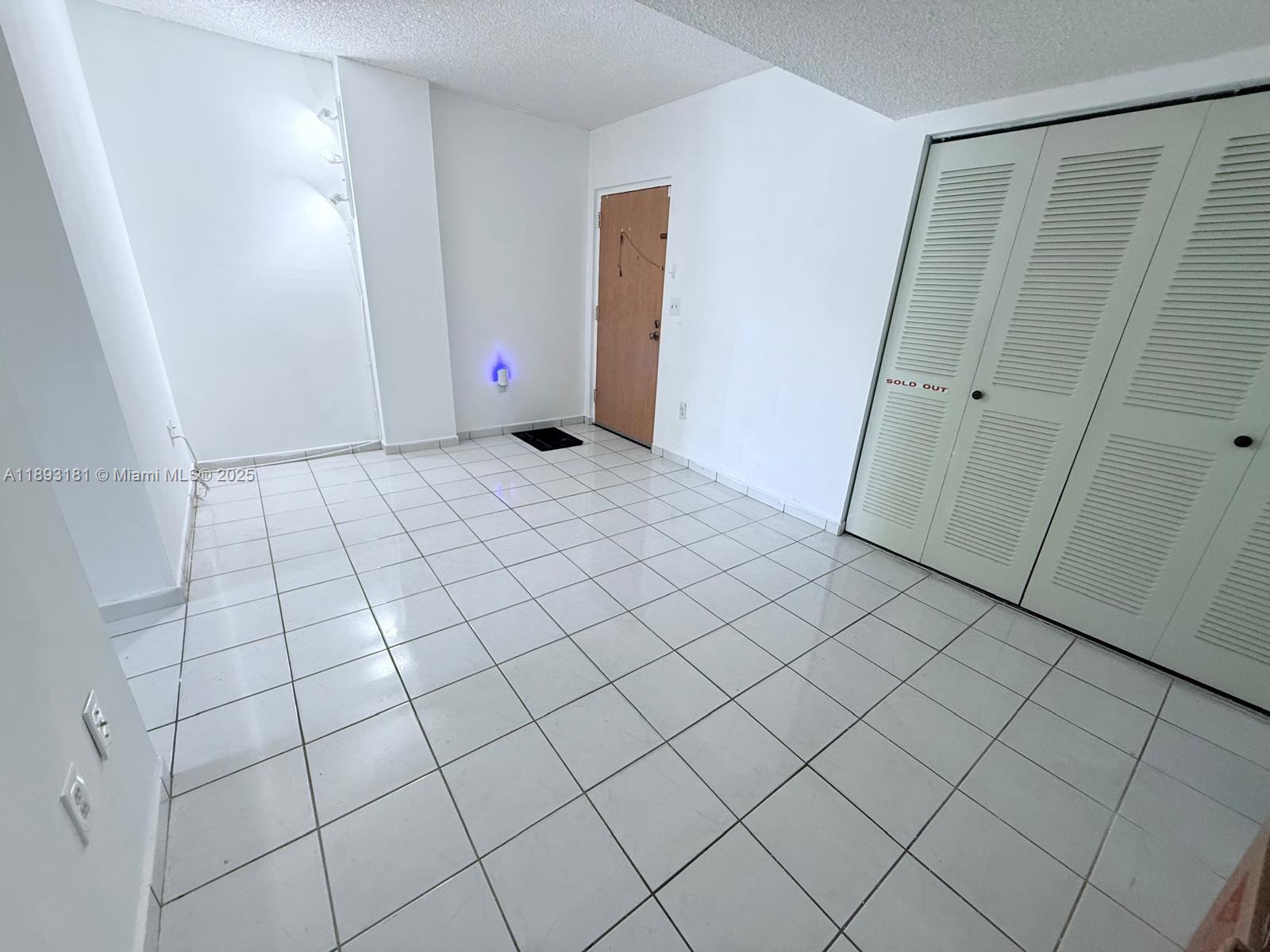 300 Northwest 42nd Avenue, Unit 109 Miami, FL 33126 - Photo 5 of 18 a view of empty room