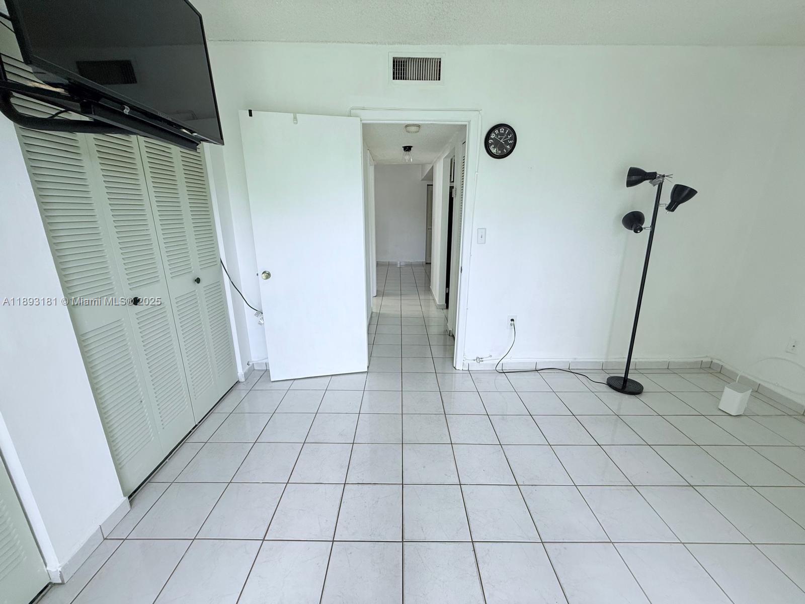300 Northwest 42nd Avenue, Unit 109 Miami, FL 33126 - Photo 10 of 18 a view of an empty room