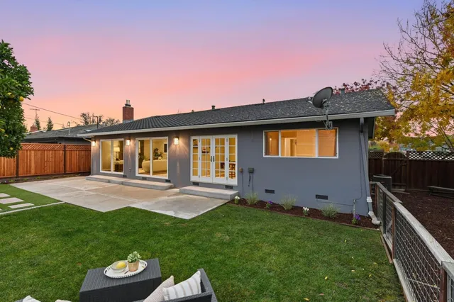 a front view of house with garage and yard