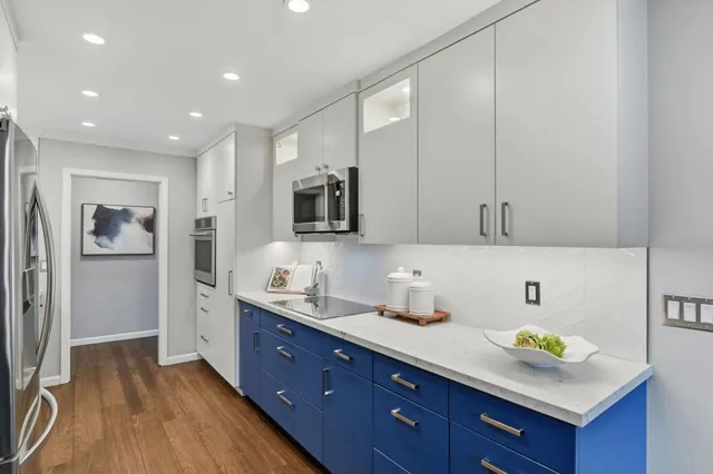 a bathroom with a sink double vanity and a mirror