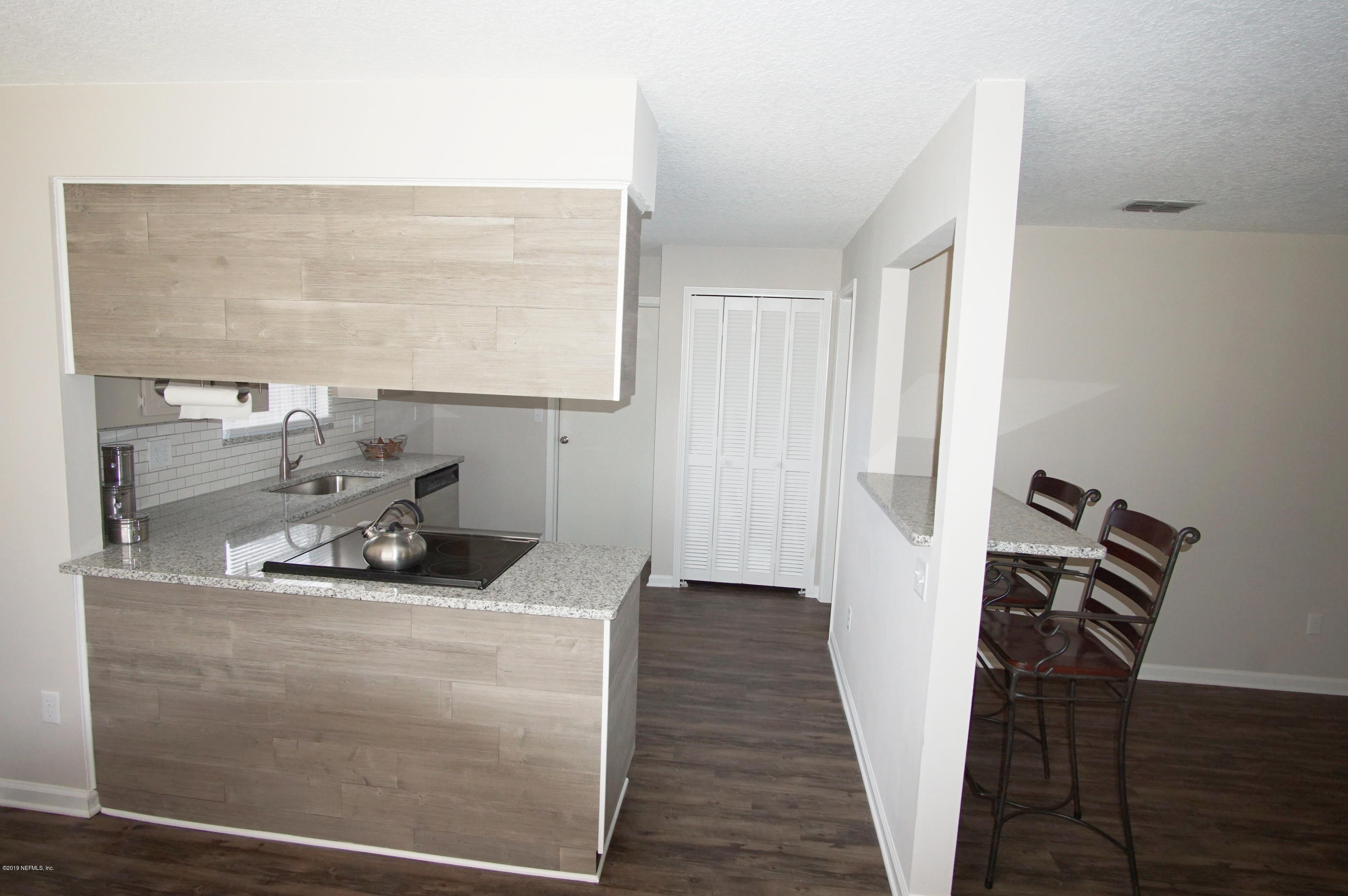 8232 Blazing Star Road Jacksonville, FL 32210 - Photo 4 of 23 Kitchen entrance