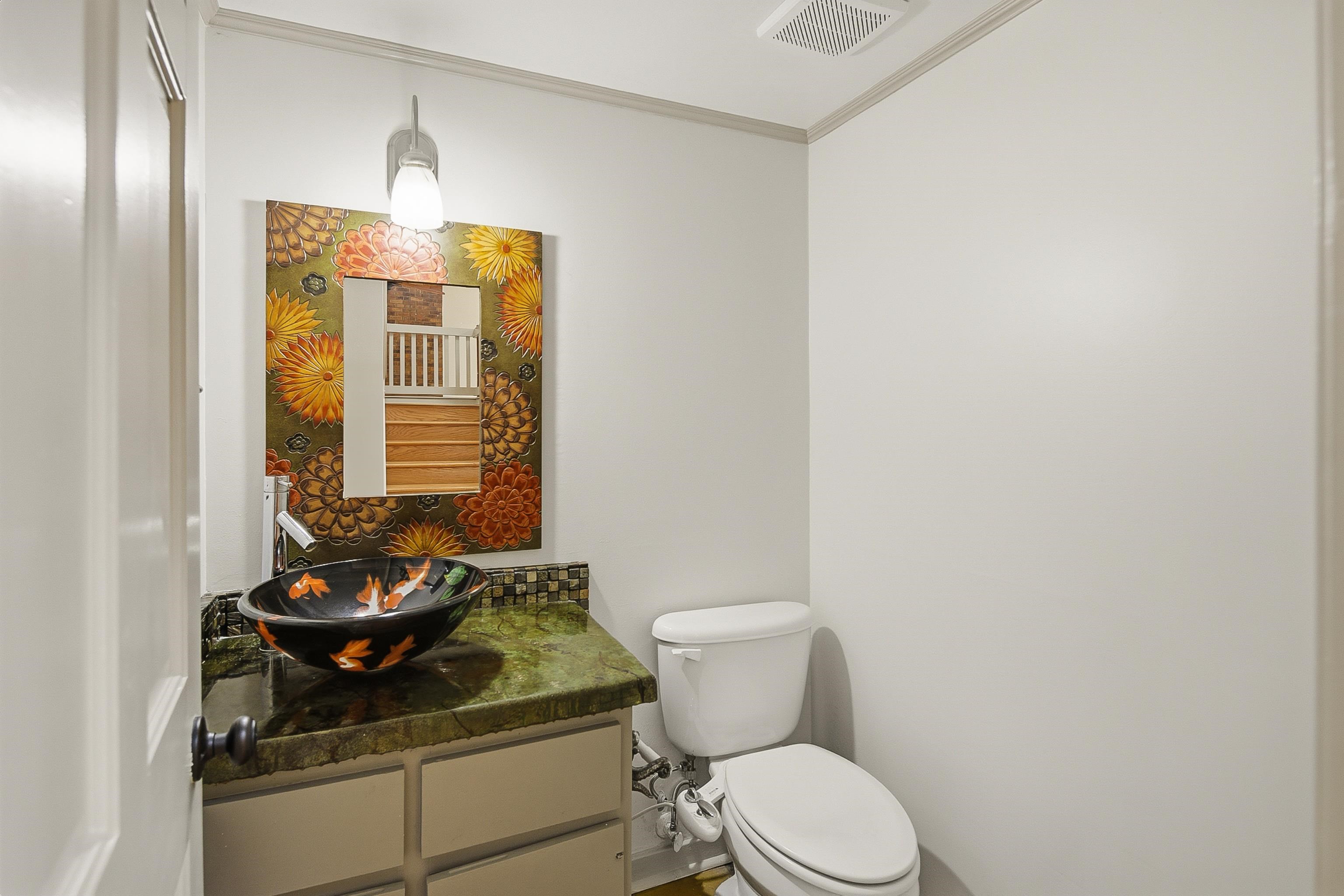 1833 New Riverdale Road Germantown, TN 38138 - Photo 19 of 40 a bathroom with a toilet and a sink