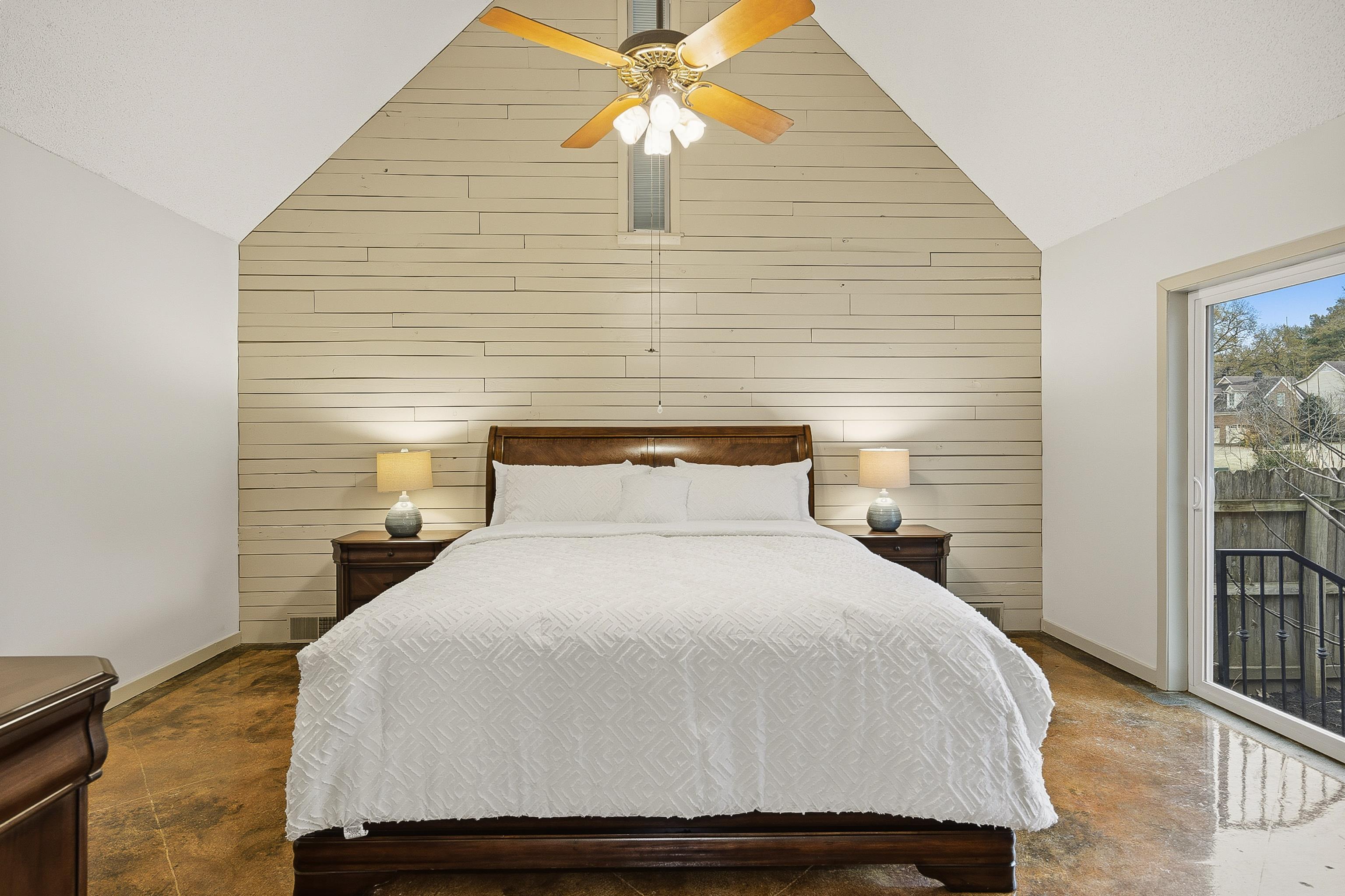 1833 New Riverdale Road Germantown, TN 38138 - Photo 20 of 40 a bedroom with a bed and a chandelier