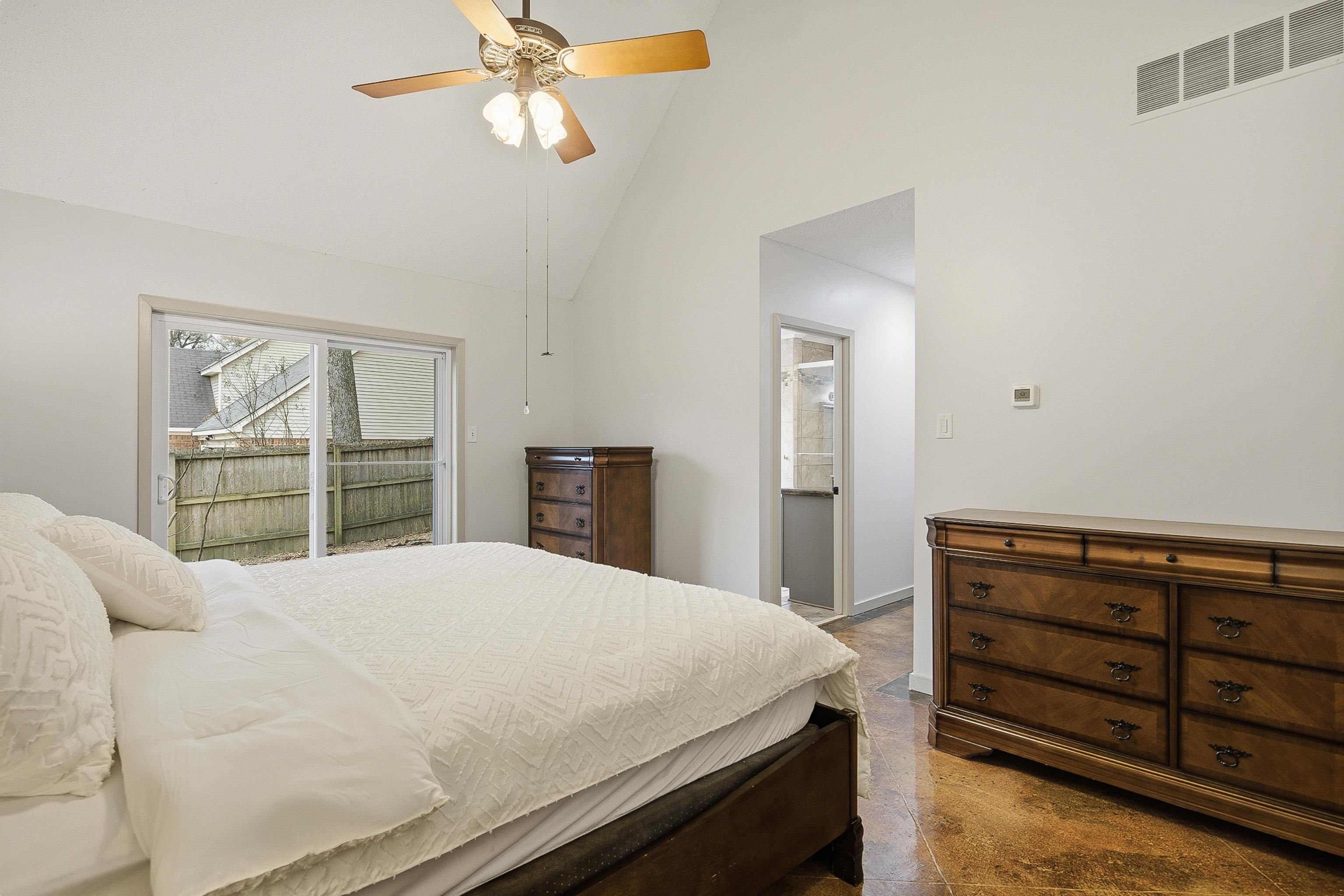 1833 New Riverdale Road Germantown, TN 38138 - Photo 21 of 40 a bedroom with a bed and a dresser