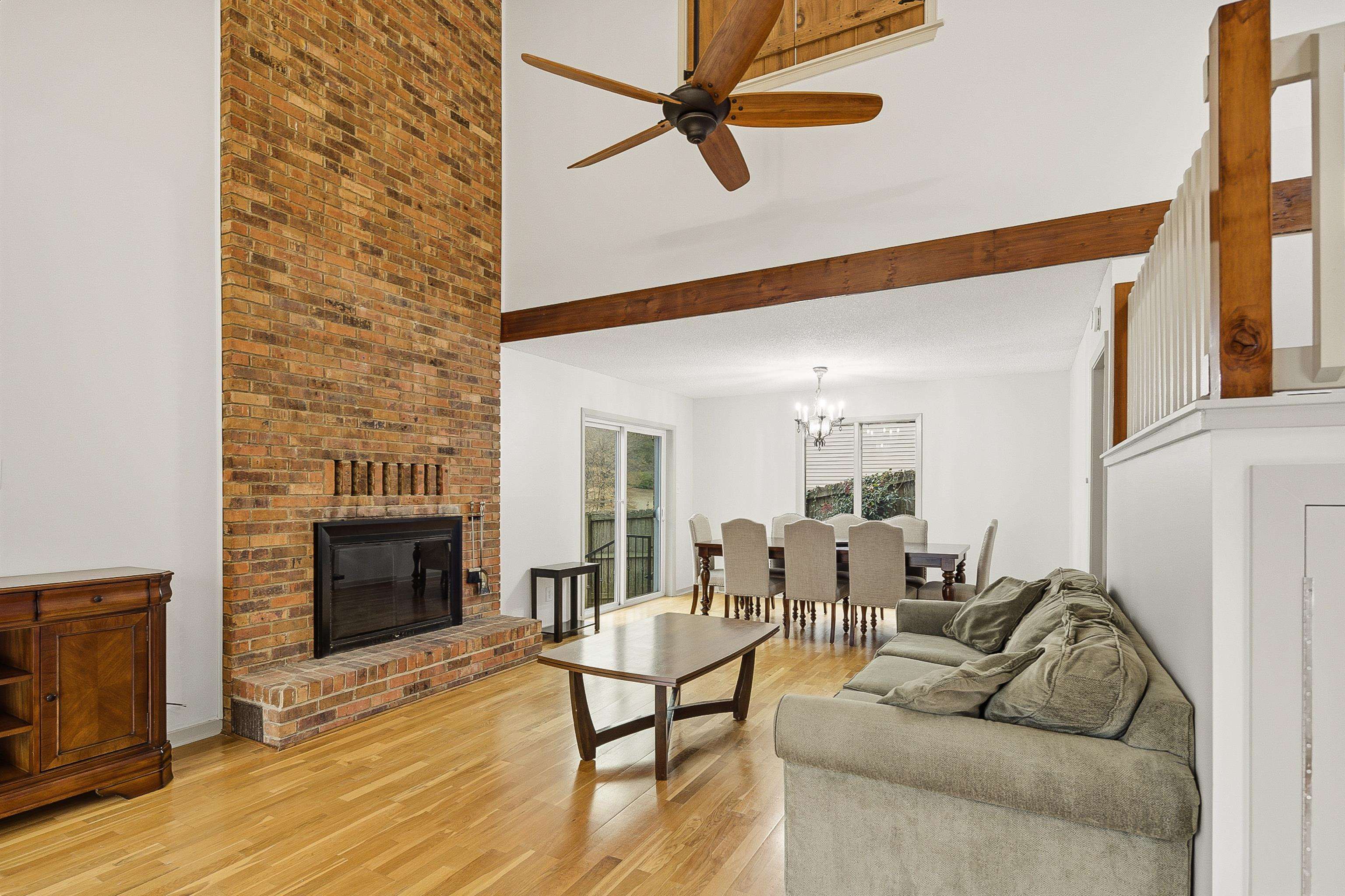 1833 New Riverdale Road Germantown, TN 38138 - Photo 8 of 40 a living room with furniture and a fireplace