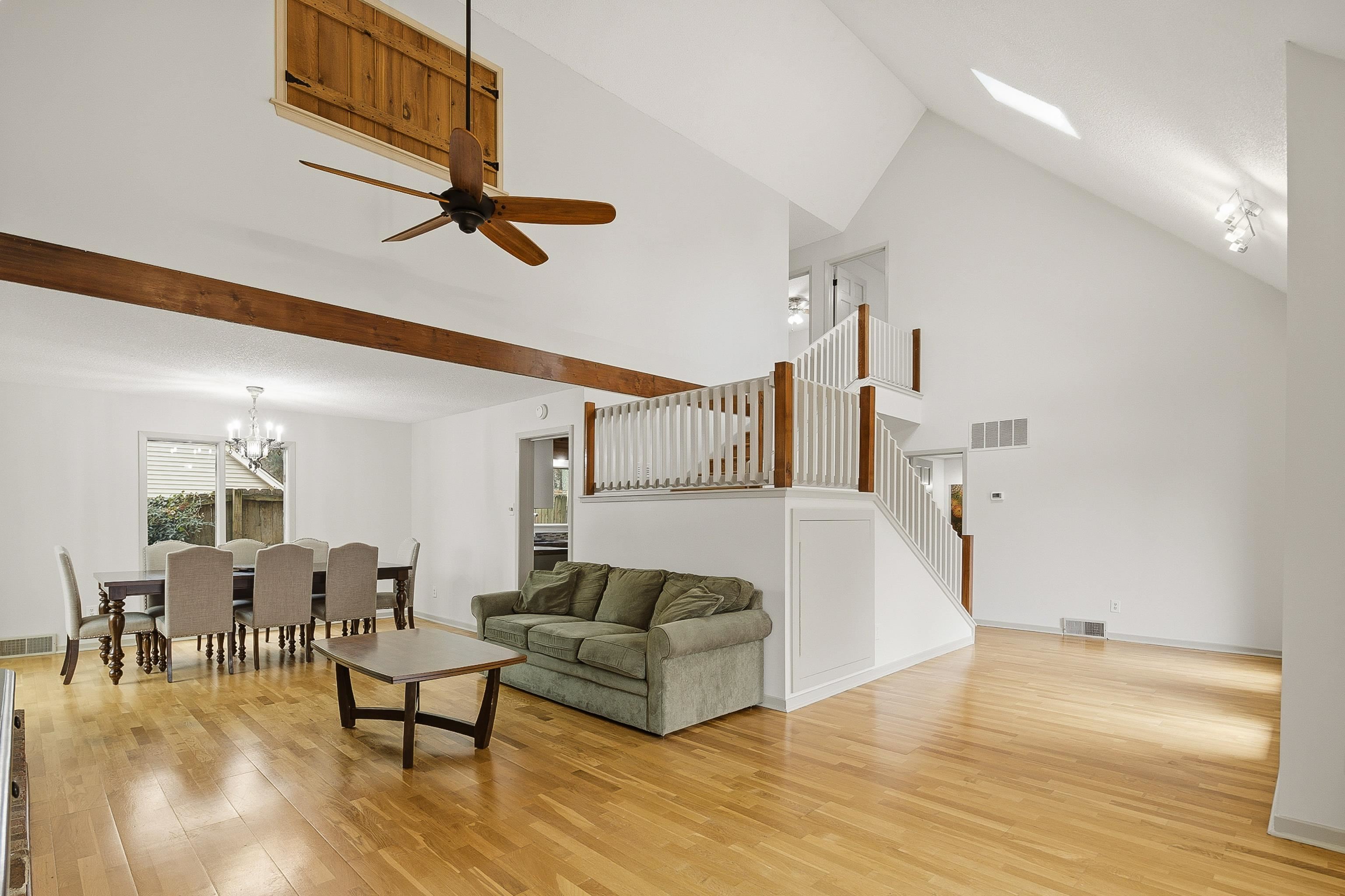 1833 New Riverdale Road Germantown, TN 38138 - Photo 9 of 40 a living room with furniture and a ceiling fan