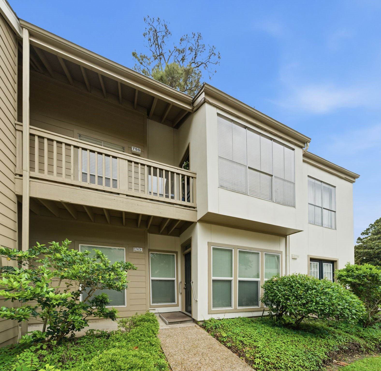 2100 Tanglewilde Street, Unit 750 Houston, TX 77063 - Photo 2 of 23 Located on the 2nd floor in a 4-unit building.