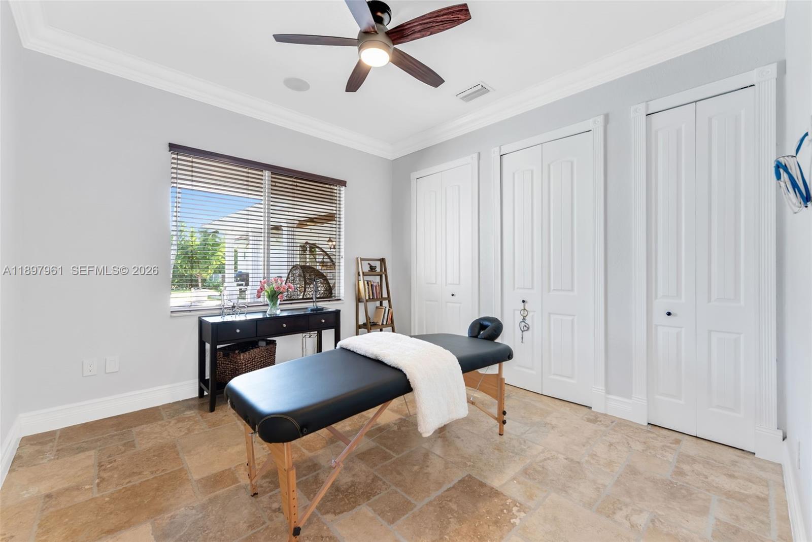 21331 Southwest 246th Street Homestead, FL 33031 - Photo 20 of 34 a workspace with furniture and window