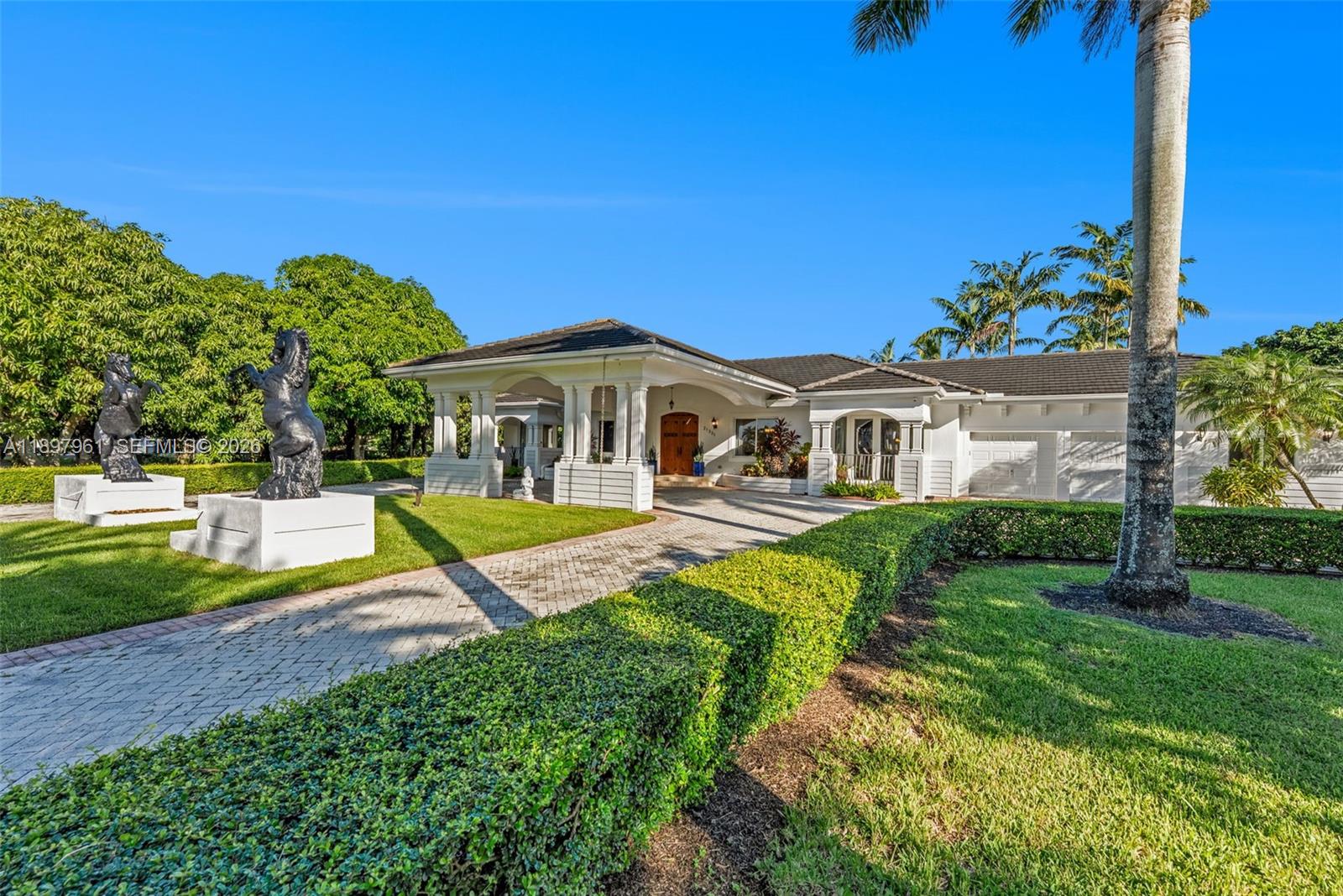21331 Southwest 246th Street Homestead, FL 33031 - Photo 3 of 34 a view of a house with swimming pool and a yard