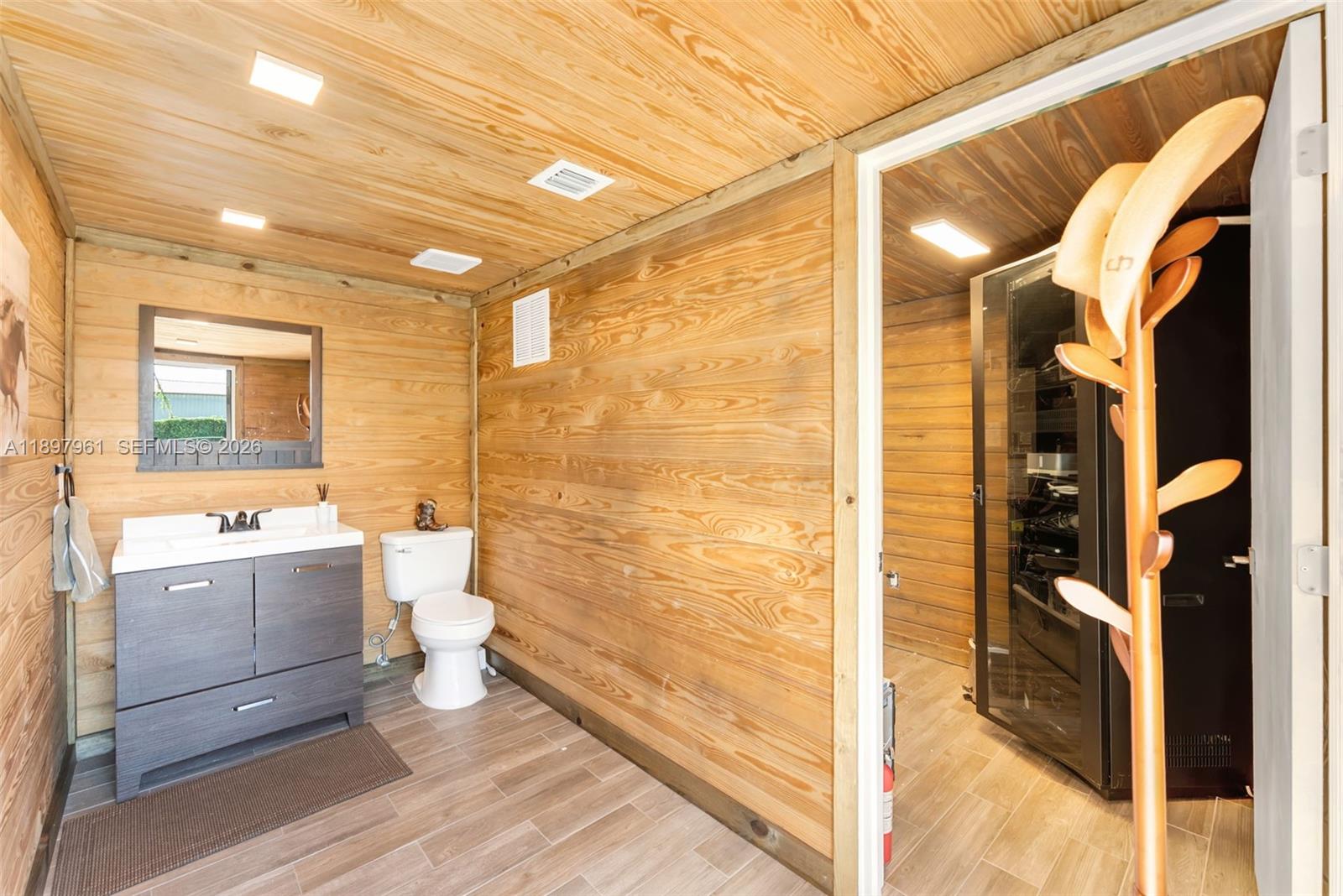 21331 Southwest 246th Street Homestead, FL 33031 - Photo 33 of 34 a bathroom with a sink a toilet and shower