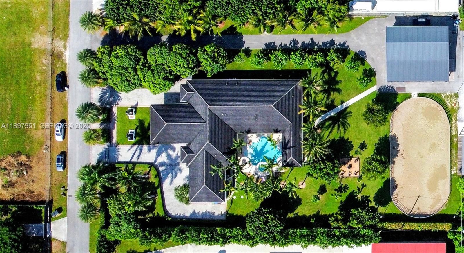 21331 Southwest 246th Street Homestead, FL 33031 - Photo 34 of 34 an aerial view of a house with a yard and garden