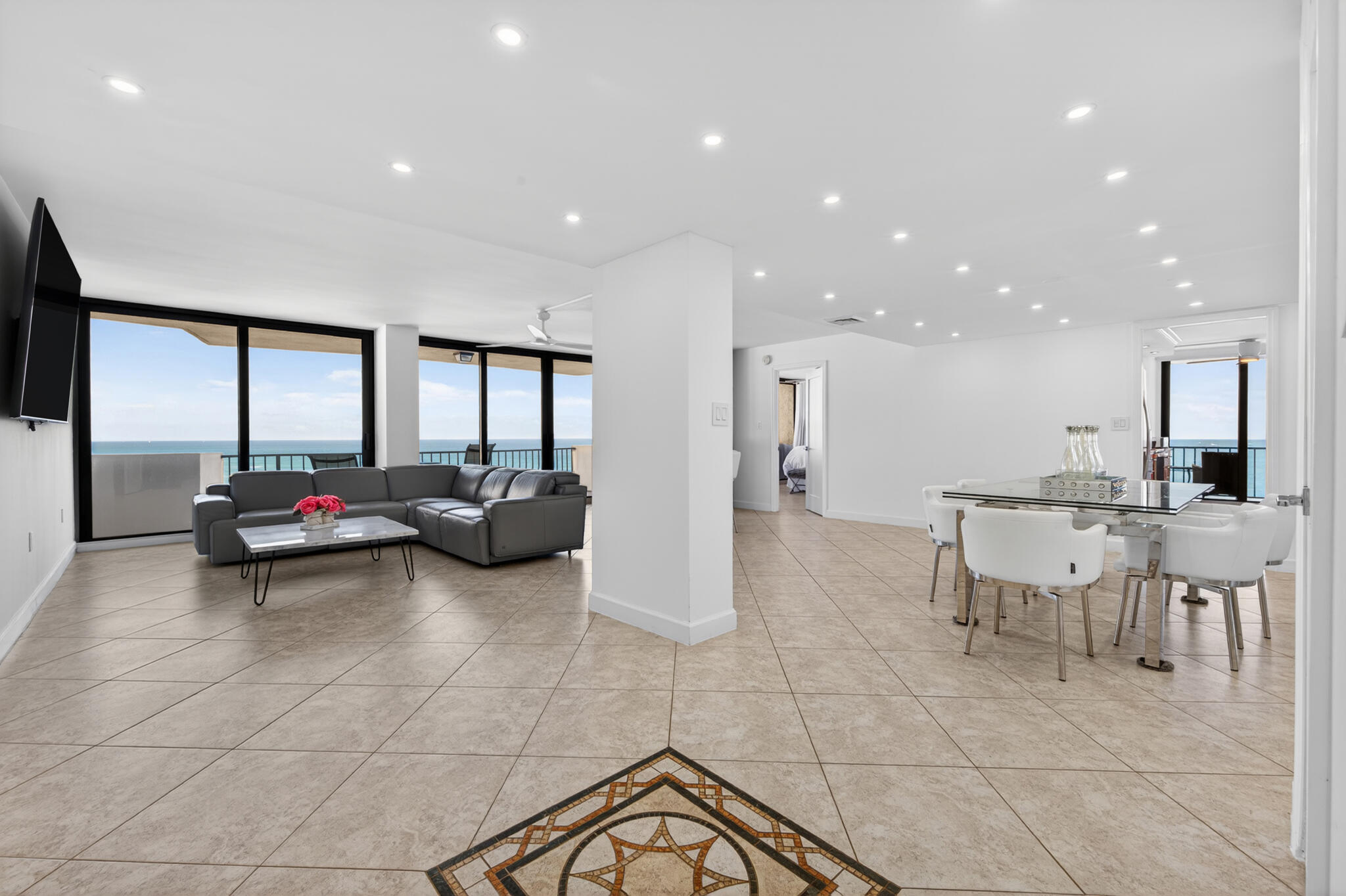 4200 North Ocean Avenue, Unit 11101 Riviera Beach, FL 33404 - Photo 5 of 35 a living room with lots of furniture and a view of living room