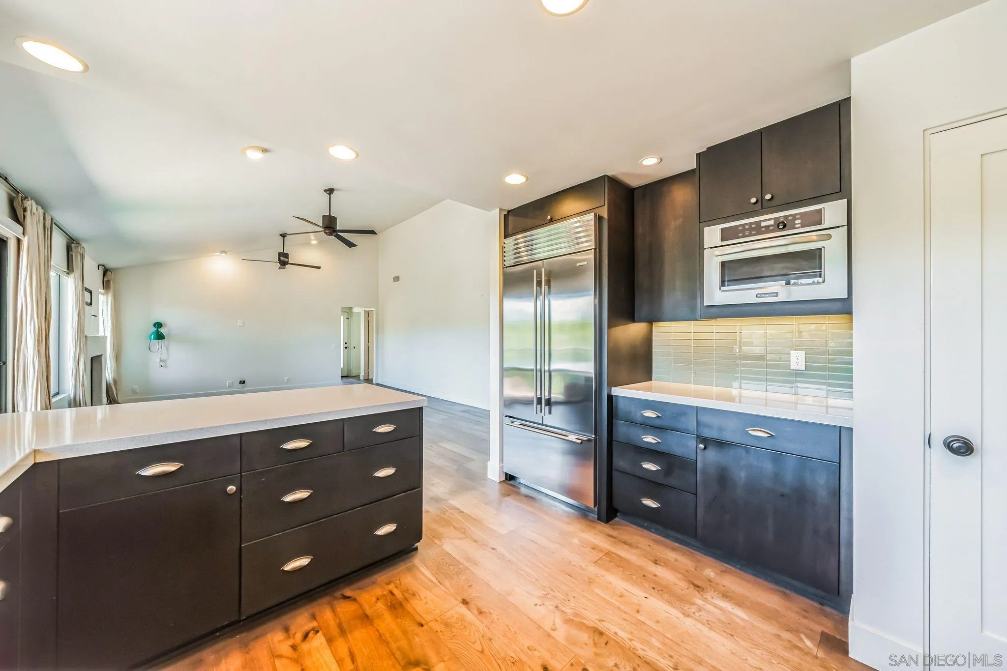 17335 Via Del Bravo Rancho Santa Fe, CA 92067 - Photo 16 of 47 a bathroom with a double vanity sink and mirror