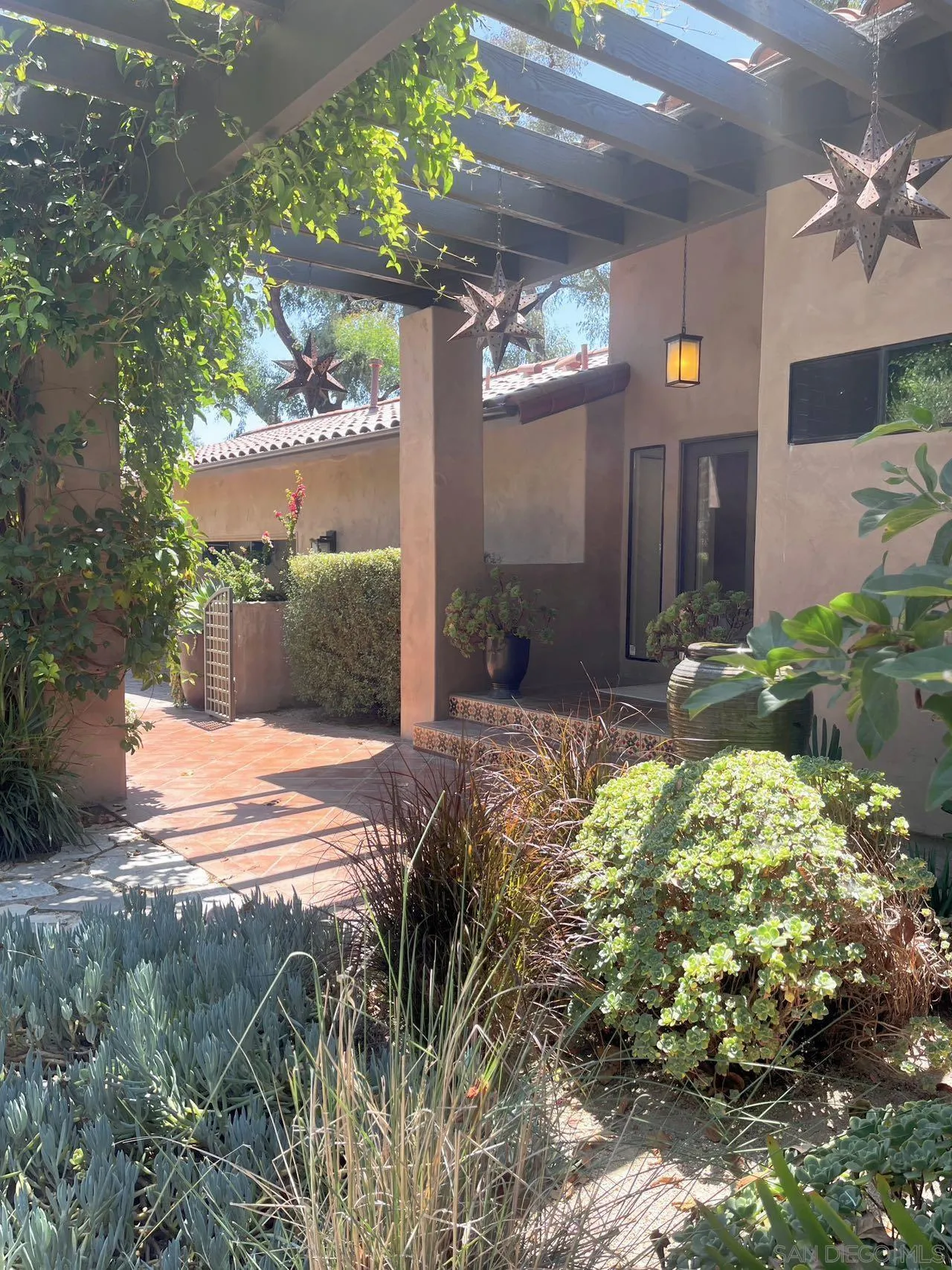 17335 Via Del Bravo Rancho Santa Fe, CA 92067 - Photo 2 of 47 a view of a house with a yard