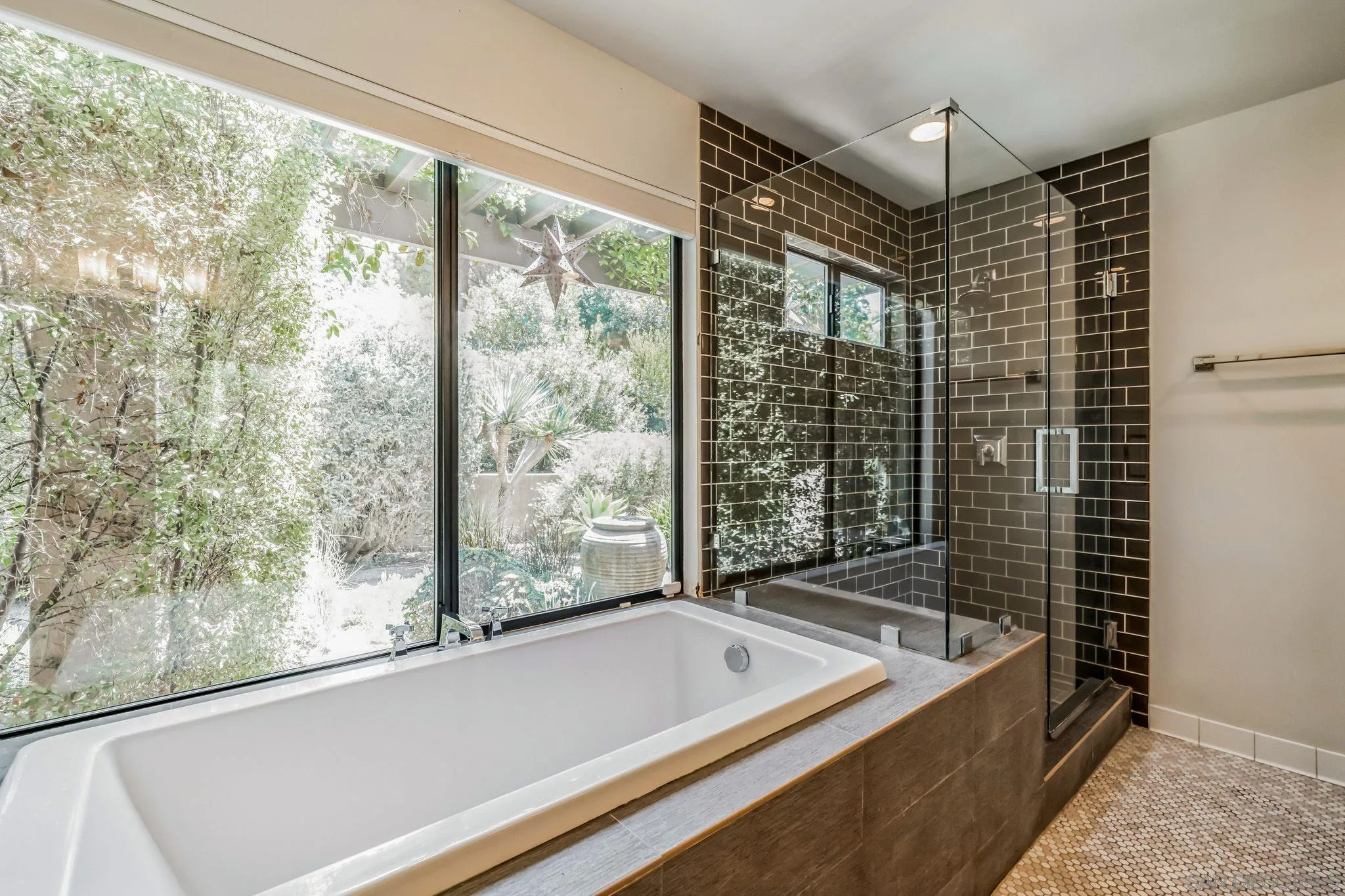 17335 Via Del Bravo Rancho Santa Fe, CA 92067 - Photo 25 of 47 a bathroom with a bathtub and shower