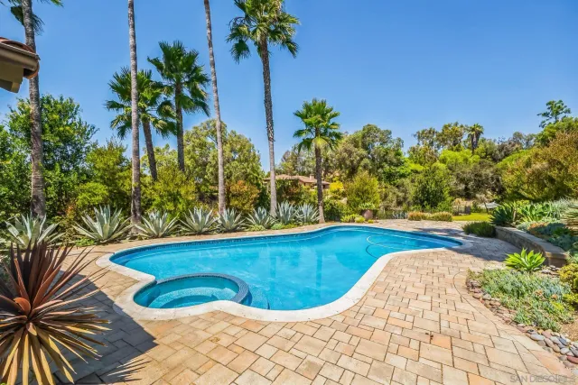 a view of a swimming pool with an outdoor space