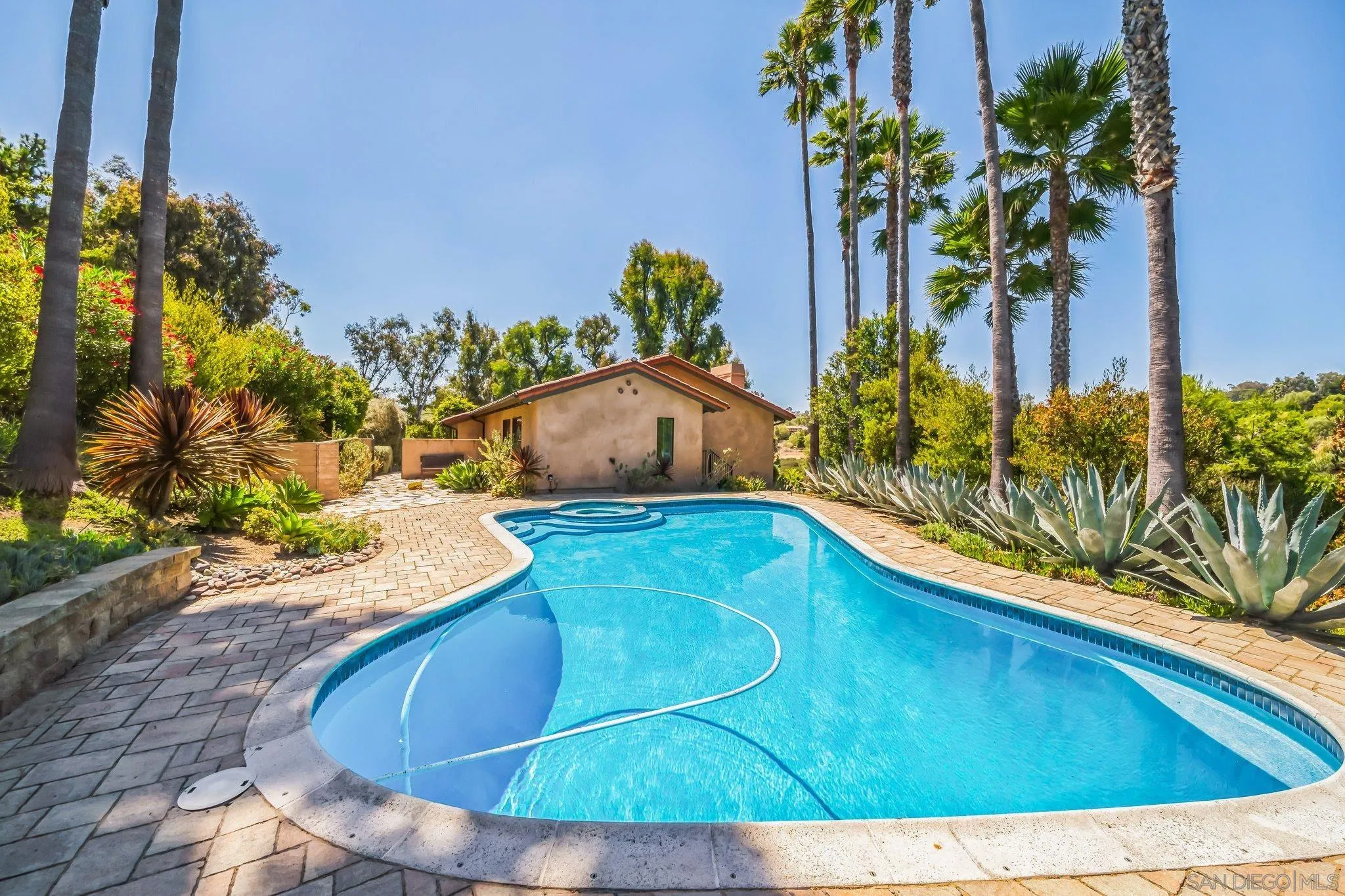 17335 Via Del Bravo Rancho Santa Fe, CA 92067 - Photo 39 of 47 a view of a swimming pool with a yard