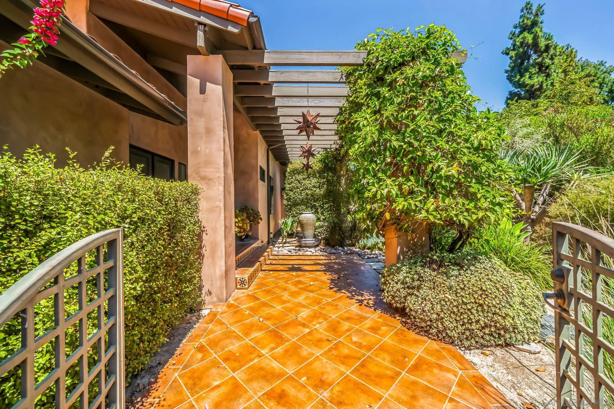17335 Via Del Bravo Rancho Santa Fe, CA 92067 - Photo 6 of 47 a view of a pathway of a house
