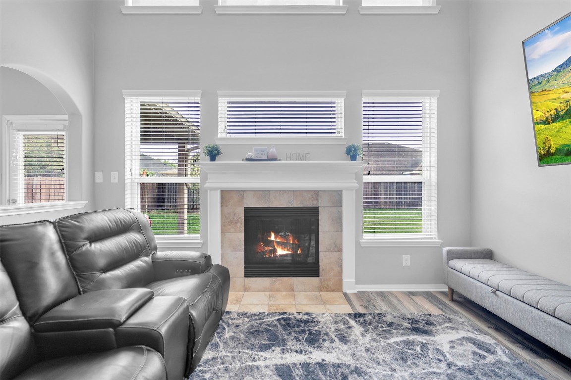 1230 Maple Ace Drive Katy, TX 77493 - Photo 20 of 40 a living room with furniture and a fireplace