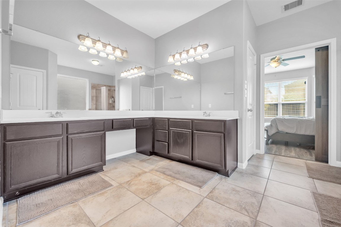 1230 Maple Ace Drive Katy, TX 77493 - Photo 25 of 40 a large bathroom with a large tub and sink