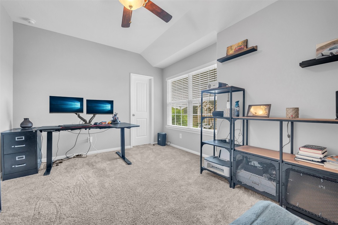 1230 Maple Ace Drive Katy, TX 77493 - Photo 29 of 40 a view of a livingroom with furniture and a window