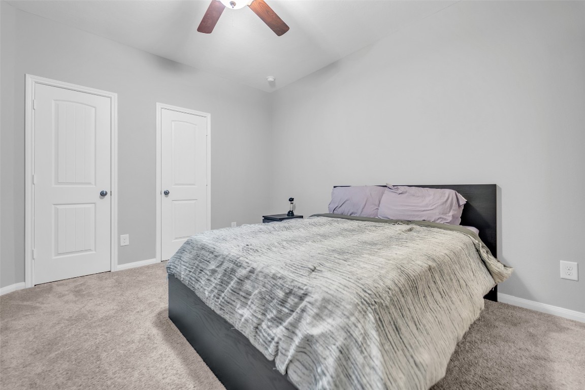 1230 Maple Ace Drive Katy, TX 77493 - Photo 33 of 40 a bedroom with bed and window
