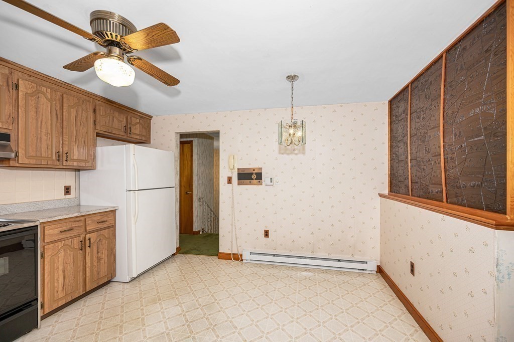 6 Thistle Road Burlington, MA 01803 - Photo 14 of 42 a view of a kitchen with a sink and cabinet