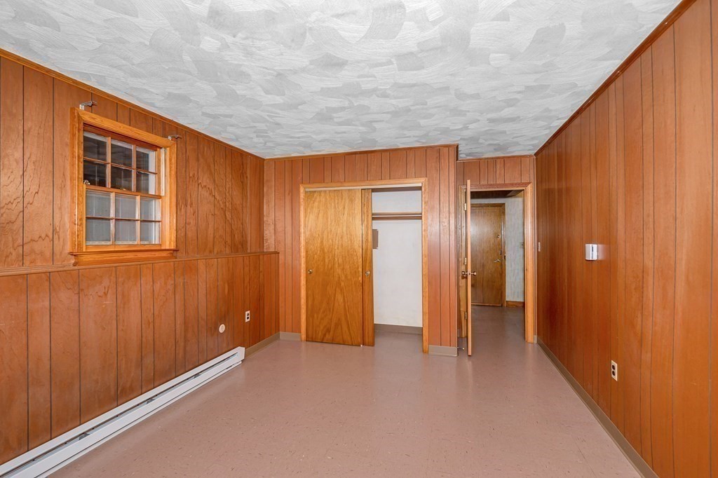 6 Thistle Road Burlington, MA 01803 - Photo 29 of 42 an empty room with windows