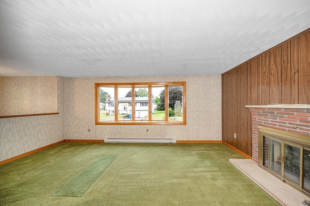 6 Thistle Road Burlington, MA 01803 - Photo 7 of 42 an empty room with windows