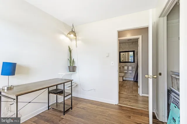 a view of a livingroom from a hallway
