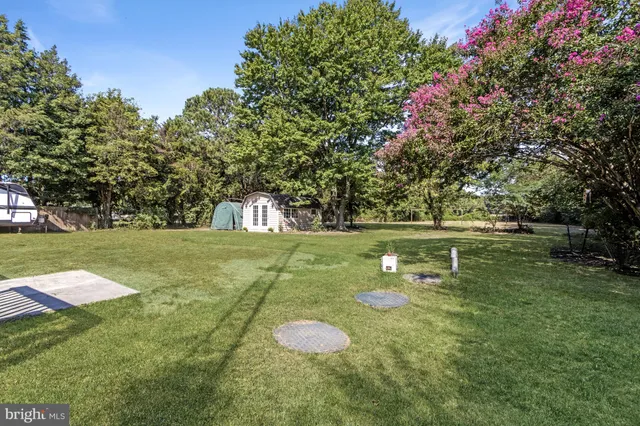 a view of a golf course with a yard