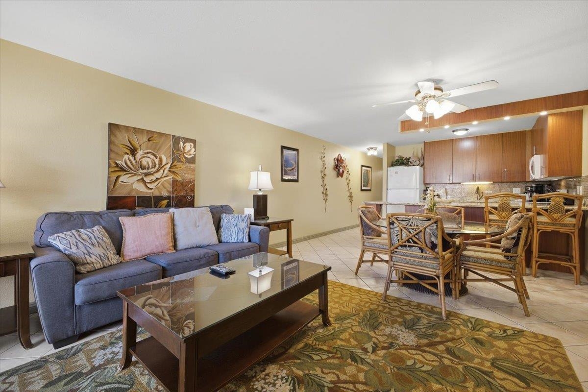 2695 South Kihei Road, Unit 5114 Kihei, HI 96753 - Photo 4 of 47 a living room with furniture and kitchen view