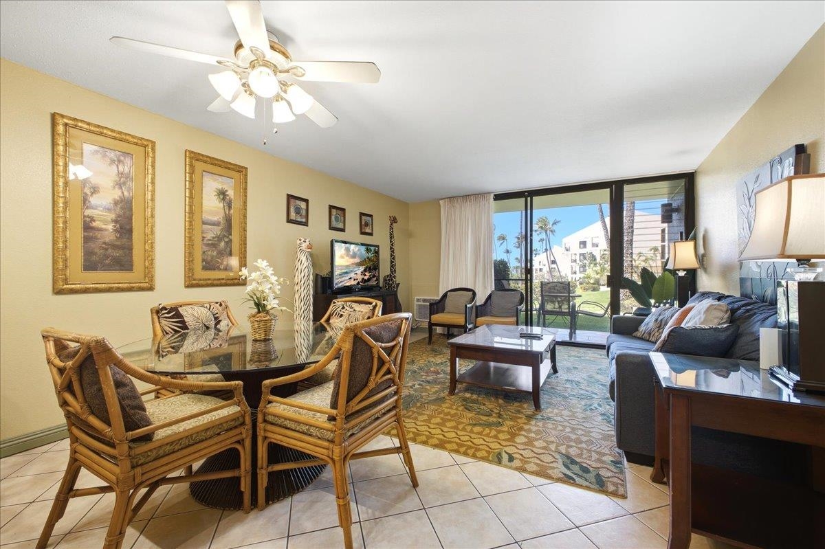 2695 South Kihei Road, Unit 5114 Kihei, HI 96753 - Photo 5 of 47 a living room with furniture and a window