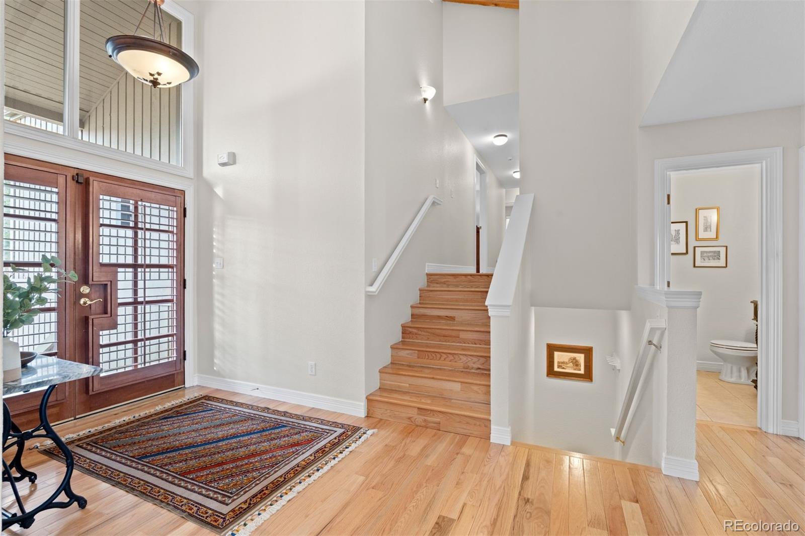 32430 Inverness Drive Evergreen, CO 80439 - Photo 17 of 50 a view of a living room and wooden floor