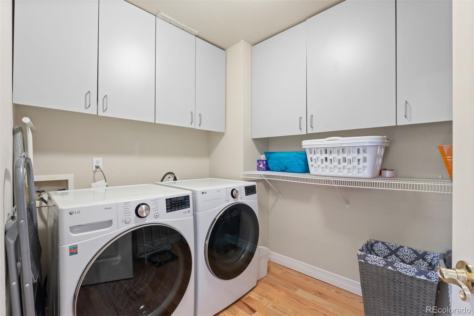 32430 Inverness Drive Evergreen, CO 80439 - Photo 28 of 50 a view of livingroom with washer and dryer