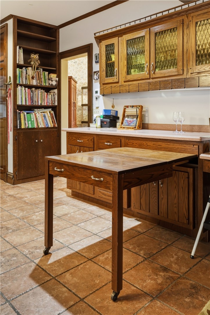 71 Olcott Road North Big Flats, NY 14814 - Photo 10 of 50 Built in table folds up and drops to look like a c