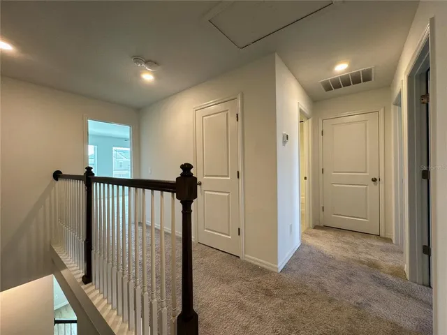 an empty room with closet area