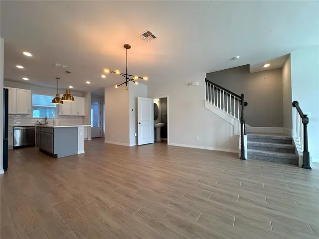 a view of a kitchen with a sink and a kitchen