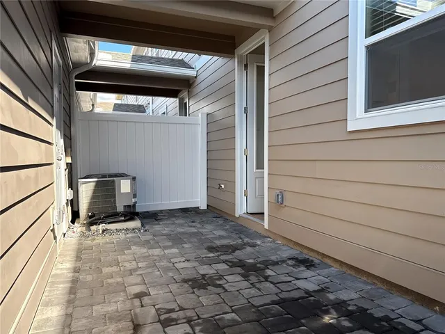 a utility room with sink dryer and washer