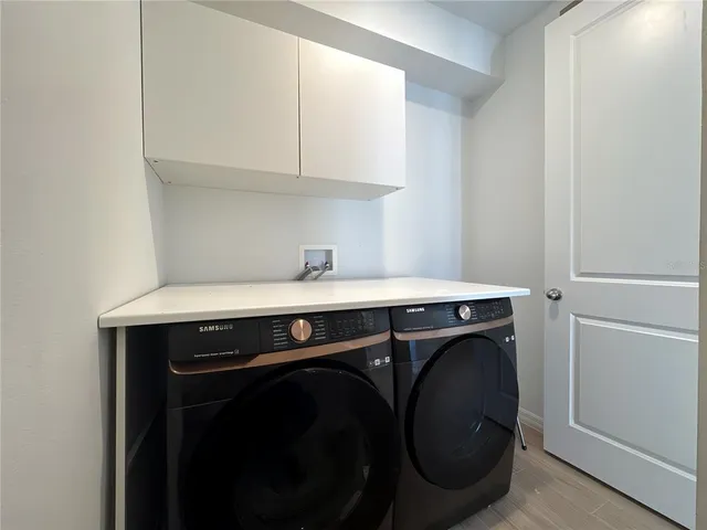 a view of a chairs and table in patio